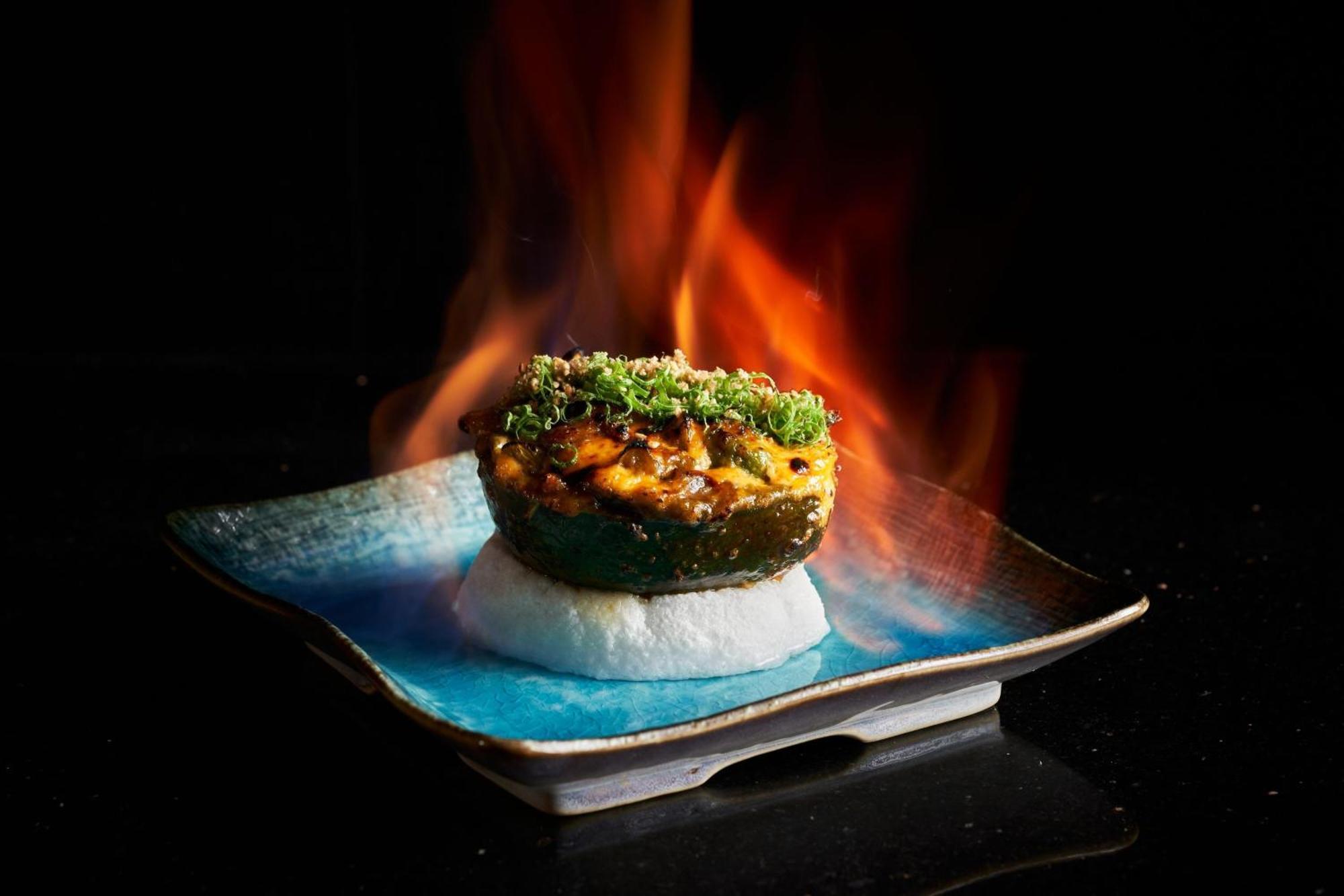 Marriott Resort Palm Jumeirah, Dubaj Kültér fotó A flaming scallop